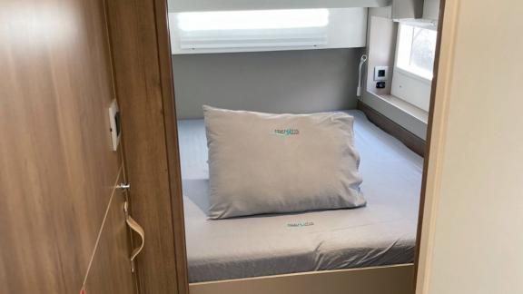 Cozy sleeping cabin in Bali 4.2 Catamaran Bella II, perfect for restful nights during your journey.