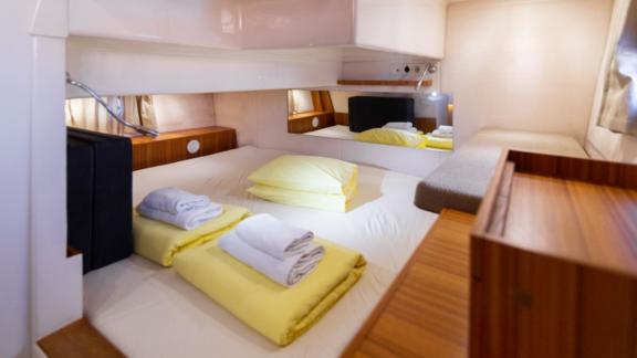 Spacious and bright bedroom on the motor yacht North Star.