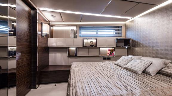Gigreca’s cabin features shelves, art pieces, and an elegant bed.