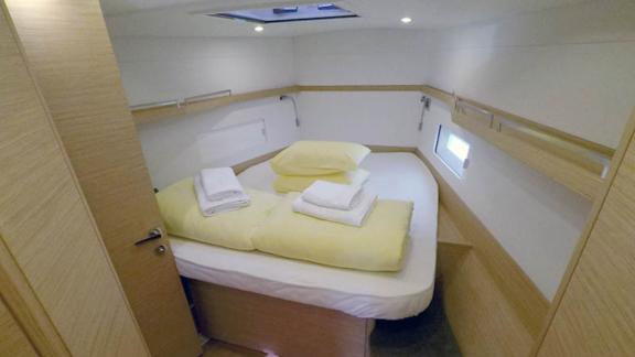 Cozy bedroom of Sportski Vuk 44 in Croatia, ideal for a sailing holiday.