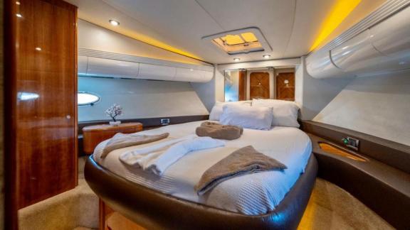 Spacious and comfortable master cabin of motor yacht Blue My Story.