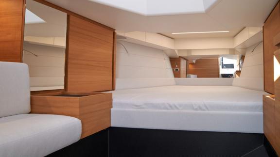 The main cabin of Jemima motor yacht offers a spacious and modern design, providing a comfortable sleeping area.