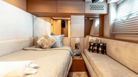 The luxurious interior cabin of Tayget is perfect for motor yacht rentals in Dubai.