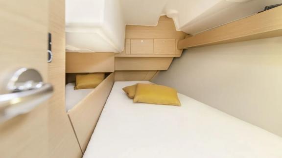 The cabin of the Gracia yacht offers a simple and comfortable sleeping area.