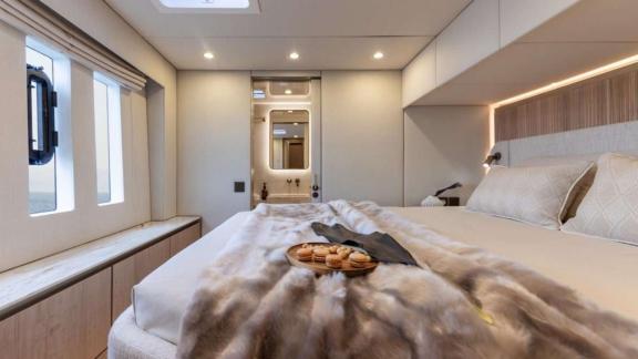 The catamaran Spice of Life offers a bright, sea-view cabin with a large bed near Athens.
