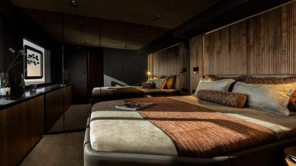 Elegant cabin interior on Amber One offers serene comfort with soft morning light.