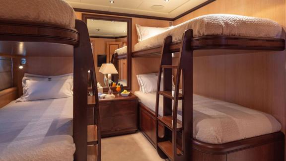 Cosmos yacht offers a cozy bunk cabin ideal for kids or extra guest accommodation.
