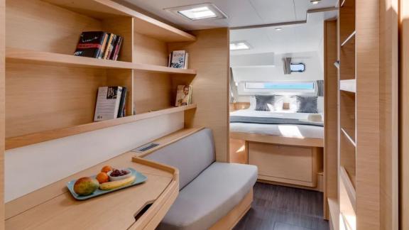 The Lagoon 42 catamaran offers a functional workspace with direct access to a comfortable bedroom.