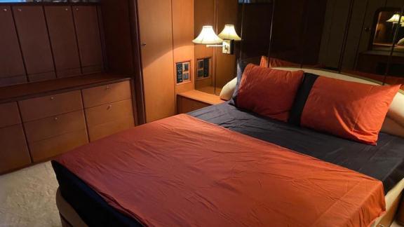 The bedroom of the motor yacht Ibiza features a cozy double bed.