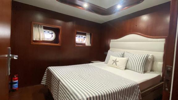 The double cabin of gulet Rose Sah is designed with a comfortable bed and stylish details.