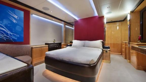 The modern bedrooms of Code 8 yacht make your Dubai luxury yacht rental unforgettable.