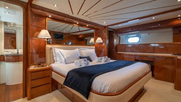 Available for charter off Athens the 4 cabin 10 guest Falcon 86 Estia Poseidon motor yacht features a spacious master ca