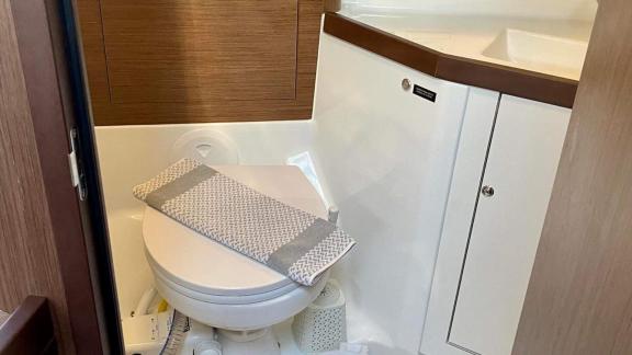 The toilet of yacht Clio features a modern and clean design, ready for a crewless charter.