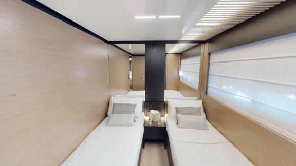 The twin guest cabin of the Ferretti 780 motor yacht adds modernity and comfort to your Dubai yacht rental experience.