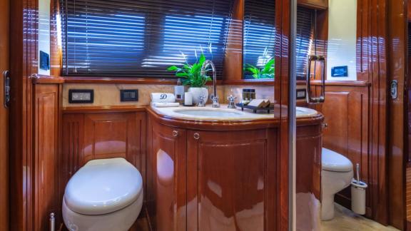 The bathroom of Divine yacht features elegant decor and modern fittings.