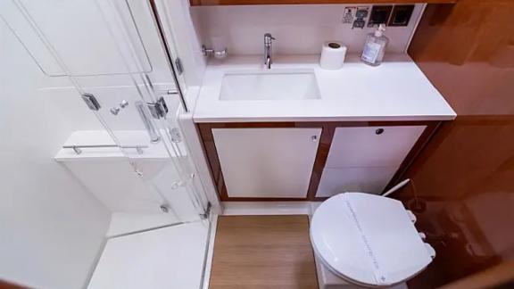 The modern bathroom of the Tourbillon yacht offers style and comfort.