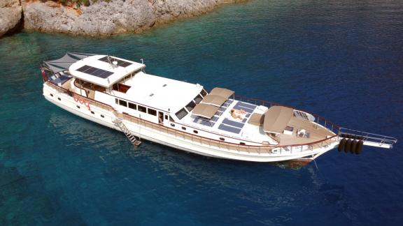 In Göcek gulet charter option Always Smile aerial view with sunbeds and spacious deck layout visible.