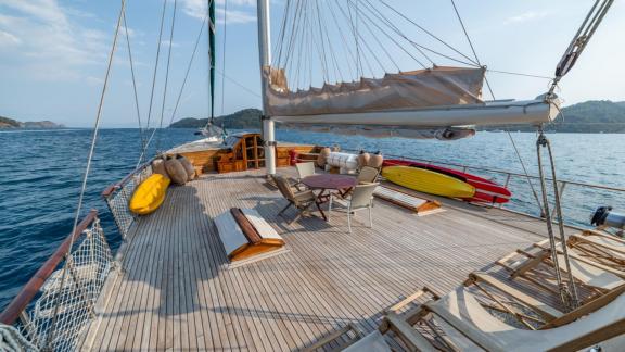 The spacious deck of the gulet yacht Amazon Solo with a view of the sea.