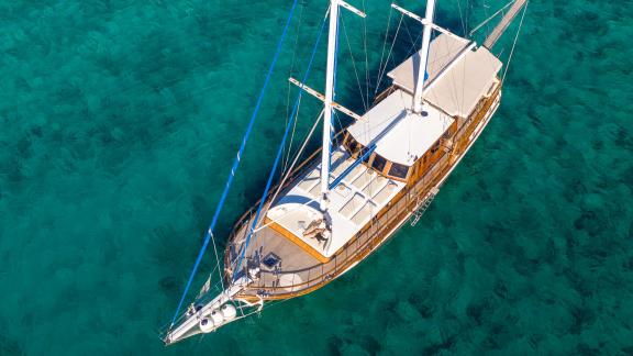 Discover the beauty of the Gulet from an aerial view in the crystal-clear, turquoise waters of Croatia.