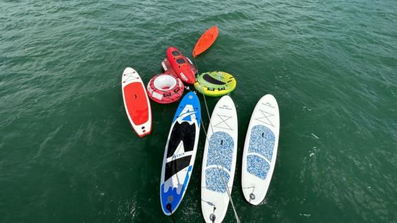 Colorful water sports equipment ready for fun and adventure on the Gulet Aria in Fethiye.