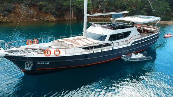 The magnificent Gulet Arni anchored in the serene waters of Göcek, Turkey.