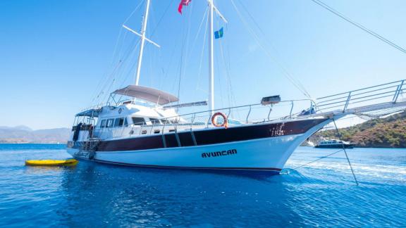 The Gulet Avuncan anchored in the clear blue waters of the Aegean, ready for an adventure.