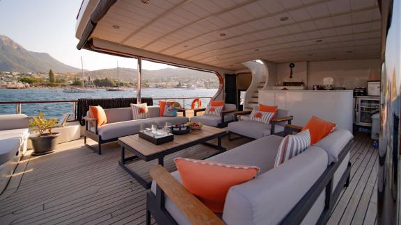 The elegant outdoor area of the Gulet Caustic in Bodrum, perfect for relaxing hours at sea.