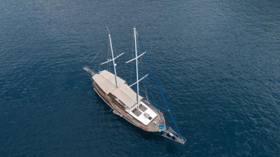 The Gulet Ceylan anchored in deep blue waters, offering a serene and luxurious yacht experience