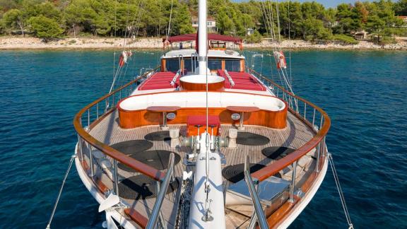 The foredeck of gulet Croatia offers a spacious seating area with comfortable cushions.