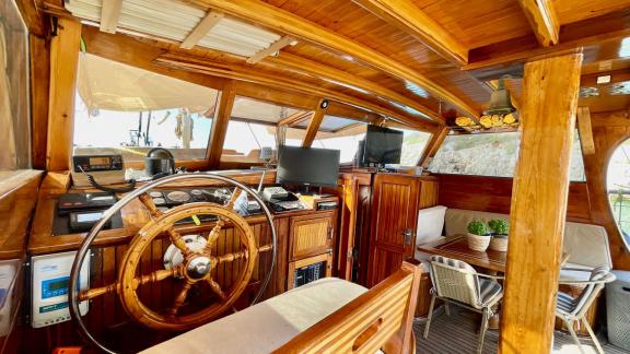 Enjoy the luxurious helm area and cozy seating on the Gulet Daphne S.