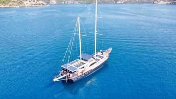Aerial view of the Deryam gulet in the bays of Bodrum, showcasing a relaxing yacht holiday atmosphere.