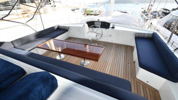 Flybridge seating area of the Deryam gulet in Bodrum Marina, offering a comfortable space for relaxation.
