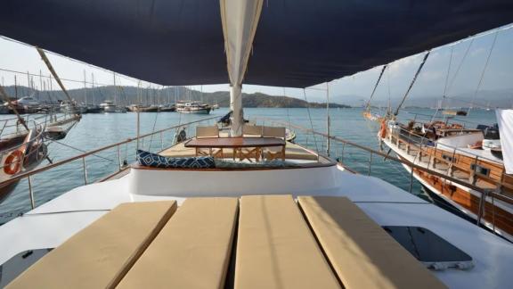 Among Marmaris yacht rental options Eloa front deck shows sunbeds and seating area with sea view.