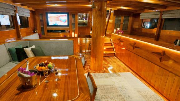 The luxurious interior of the Flas VII has cosy seating and a stylish dining area.