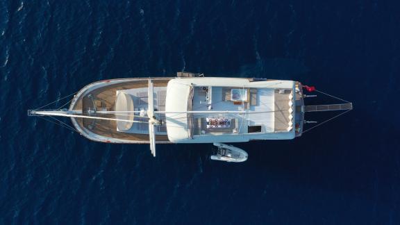 Top view of the Gulet Freedom in the waters of Marmaris, with decks and amenities clearly visible.