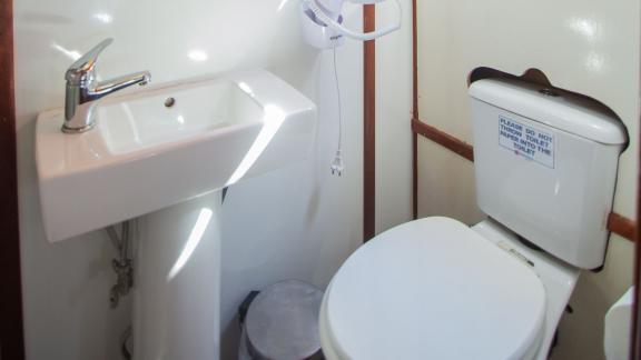 The functional bathroom on Gulet Hemera offers all necessary amenities on board.