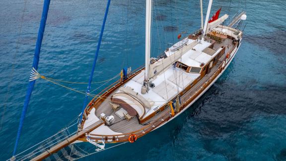 Aerial view of the gulet yacht Jasemin 1 in the clear turquoise water.