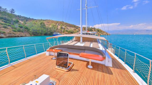 The spacious sun deck of the Gulet Kasapoglu 6 offers comfortable lounging areas and stunning sea views.