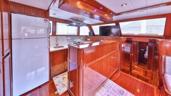 The well-equipped galley of the Gulet Kasapoglu 6 features modern appliances and ample space.