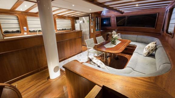 Elegant saloon area on the 6-cabin gulet Koray Ege, available for hire in Marmaris.