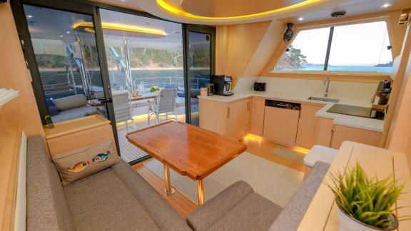 Cozy living area and kitchen of the 3-cabin Gulet Limonata in Göcek, Turkey.