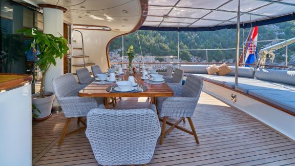 The dining area on the Gulet Lotus in Croatia offers an inviting atmosphere for al fresco dining.