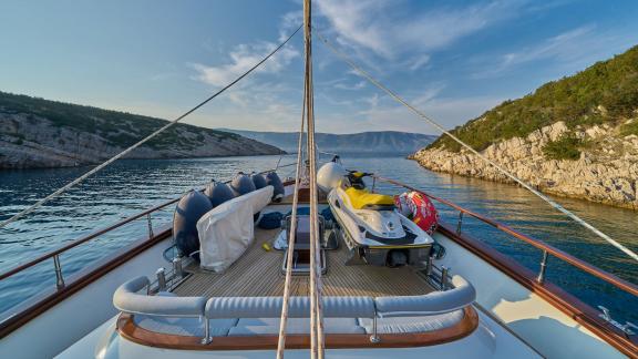 The water sports deck of the Gulet Lotus in Croatia, equipped with jet skis and other water sports equipment.