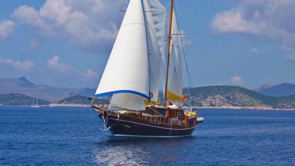 Gulet Nikola sailing majestically in Bodrum waters. An unforgettable experience for sailing enthusiasts.