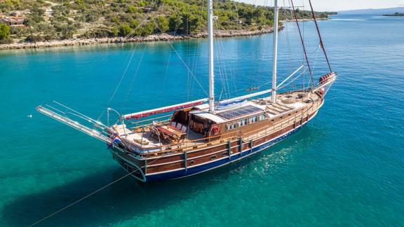 Luxurious gulet Nostra Vita with 5 cabins, anchored in the turquoise waters of Split, Croatia.