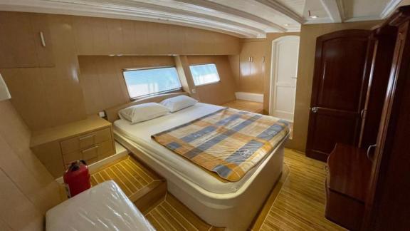 Pam gulet for 10 guests features a spacious double cabin with wooden interiors and comfortable accommodation.