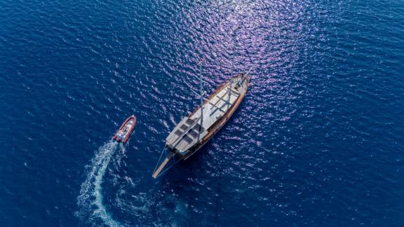 Princess Alize gulet is cruising in the open sea near Marmaris accompanied by a tender boat.