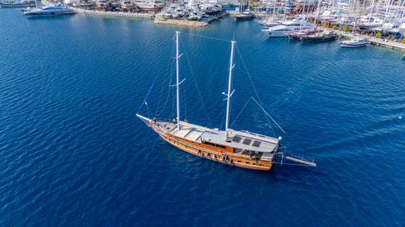 Princess Alize gulet is leaving Marmaris marina and heading out to sea during a yacht charter holiday.