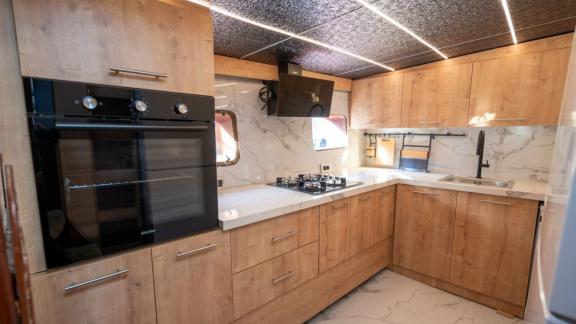 Princess Alize gulet features a fully equipped modern kitchen with spacious counters and built in appliances onboard.