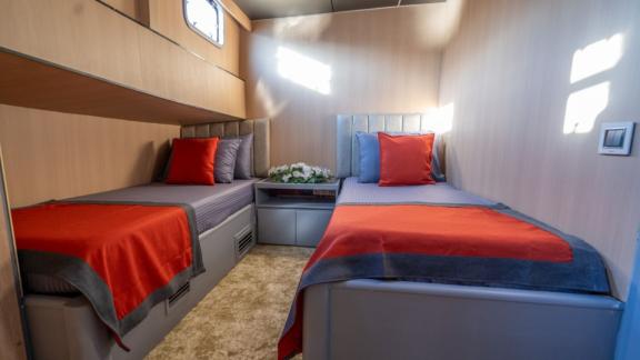 Princess Alize gulet features a comfortable twin cabin with two separate beds and modern interior details onboard.